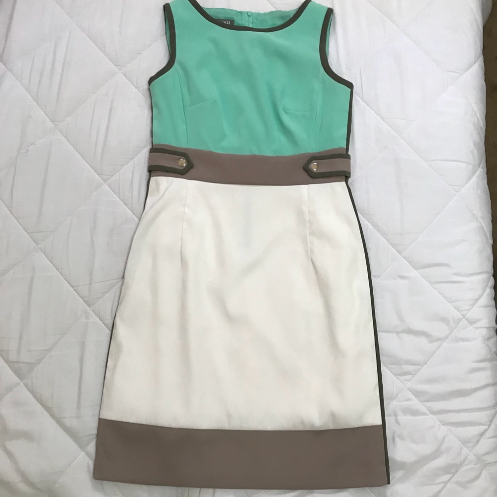A light blue with white and gray dress